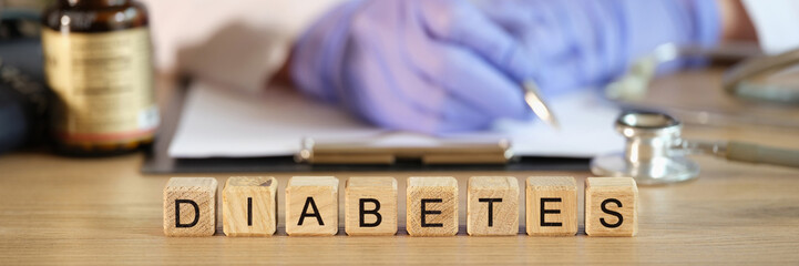 Diabetes word made with wooden cubes in row