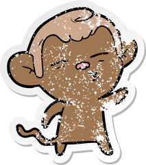 distressed sticker of a cartoon suspicious monkey