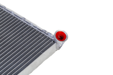 Aluminum radiator of a car stove on a white background, close-up, isolated