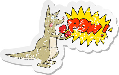 retro distressed sticker of a cartoon boxing kangaroo