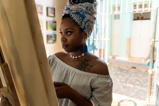Cuban Painter Creates A Painting In Her Art Studio