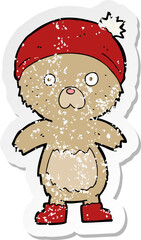 retro distressed sticker of a cartoon cute teddy bear