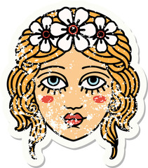 traditional distressed sticker tattoo of female face with crown of flowers