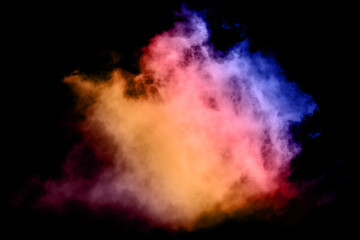 Fototapeta na wymiar Colored clouds and smoke on a black background. Very nice abstract art perfect for a cell phone background.