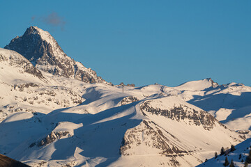 Blue morning sky over the French Alps mountains, Alpe d'Huez, France