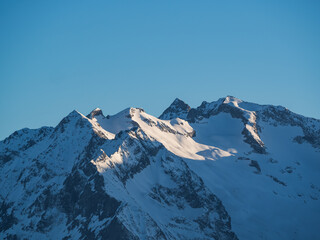 Obraz premium Blue morning sky over the French Alps mountains, Alpe d'Huez, France