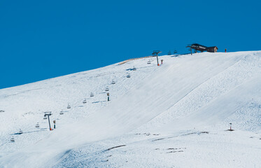 Ski slope on mountain slope in Alpe D'Huez ski resort - France