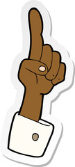 sticker of a cartoon pointing hand