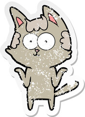 distressed sticker of a happy cartoon cat shrugging;shoulders