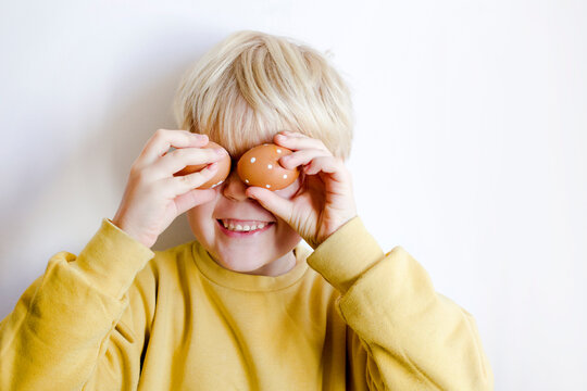 boy with easter eggs