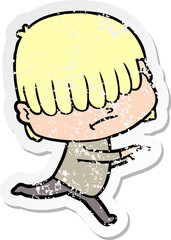 distressed sticker of a cartoon boy with untidy hair