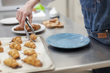 Pastry chef making sweets, rugelach and croasant