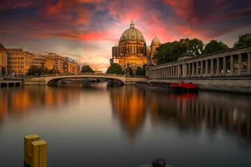 Museum Island view at sunset, with water reflecting buildings