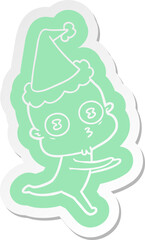 cartoon  sticker of a weird bald spaceman running wearing santa hat