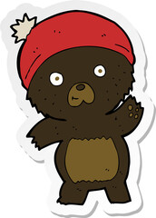 sticker of a cute cartoon black bear