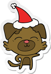 sticker cartoon of a dog pointing wearing santa hat