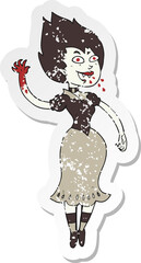 retro distressed sticker of a cartoon blood sucking vampire girl