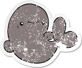 distressed sticker of a cartoon whale