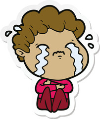 Obraz premium sticker of a cartoon man crying