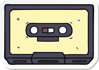 Obraz premium sticker of a cartoon old cassette tape
