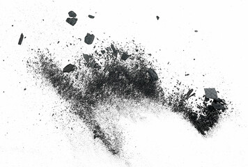Black charcoal particles on a white background, top view. Activated charcoal powder for facial...