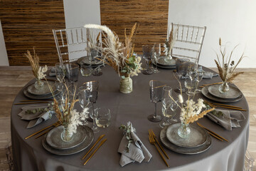table setting. Glassware and cutlery for catered event dinner.