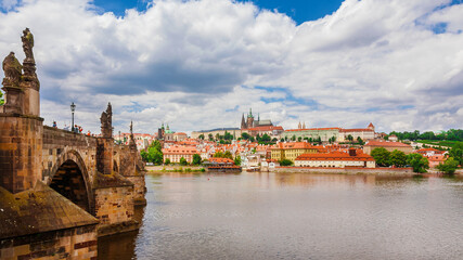 Fototapeta premium View of Prague historical center and River Vltala with the famous Charles Bridge