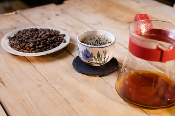 Professional barista preparing coffee. Young woman making coffee. Alternative ways of brewing coffee. Coffee shop concept
