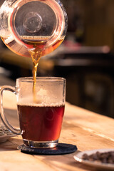 Professional barista preparing coffee. Young woman making coffee. Alternative ways of brewing coffee. Coffee shop concept