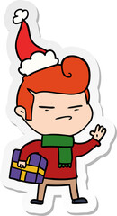 sticker cartoon of a cool guy with fashion hair cut wearing santa hat