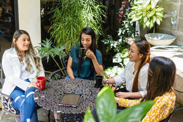Group of women having coffee. 