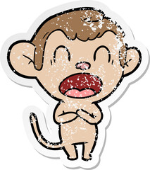 distressed sticker of a yawning cartoon monkey
