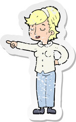 retro distressed sticker of a cartoon friendly woman pointing