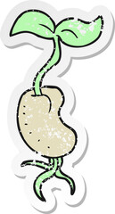 retro distressed sticker of a cartoon sprouting seed
