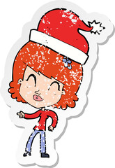 retro distressed sticker of a cartoon woman ready for christmas
