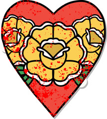 traditional distressed sticker tattoo of a heart and flowers