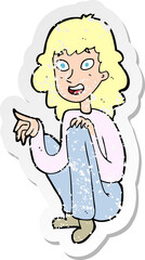 retro distressed sticker of a cartoon happy woman sitting and pointing
