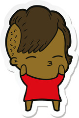sticker of a cartoon squinting girl