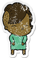 distressed sticker of a cartoon squinting girl