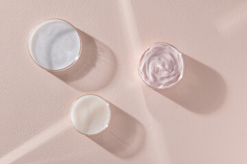 Glass petri dish with transparent pure serum for skin care