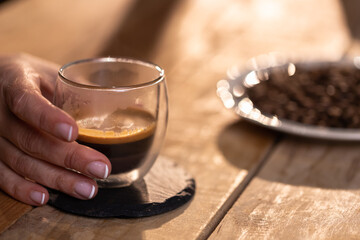 Professional barista preparing coffee. Young woman making coffee. Alternative ways of brewing coffee. Coffee shop concept