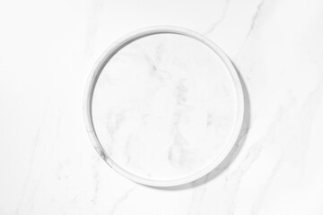Beauty cosmetics product presentation flat lay mockup scene with white marble circle plate on white...