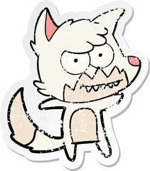 distressed sticker of a cartoon grinning fox