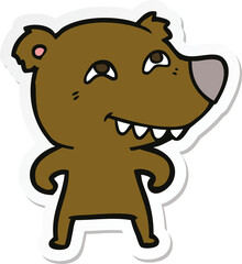 sticker of a cartoon bear showing teeth
