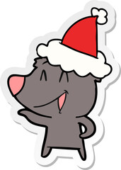 laughing bear sticker cartoon of a wearing santa hat