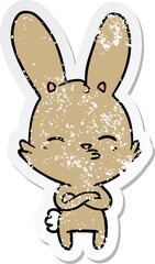distressed sticker of a curious bunny cartoon