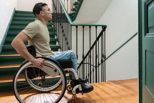 Portrait Of A Person With A Disability On The Stairs