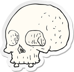 sticker of a cartoon old skull