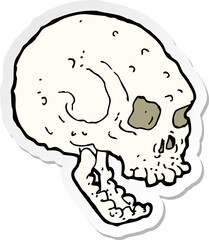 sticker of a cartoon spooky skull