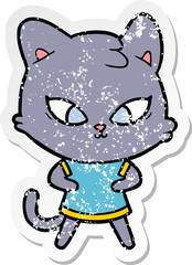 distressed sticker of a cute cartoon cat